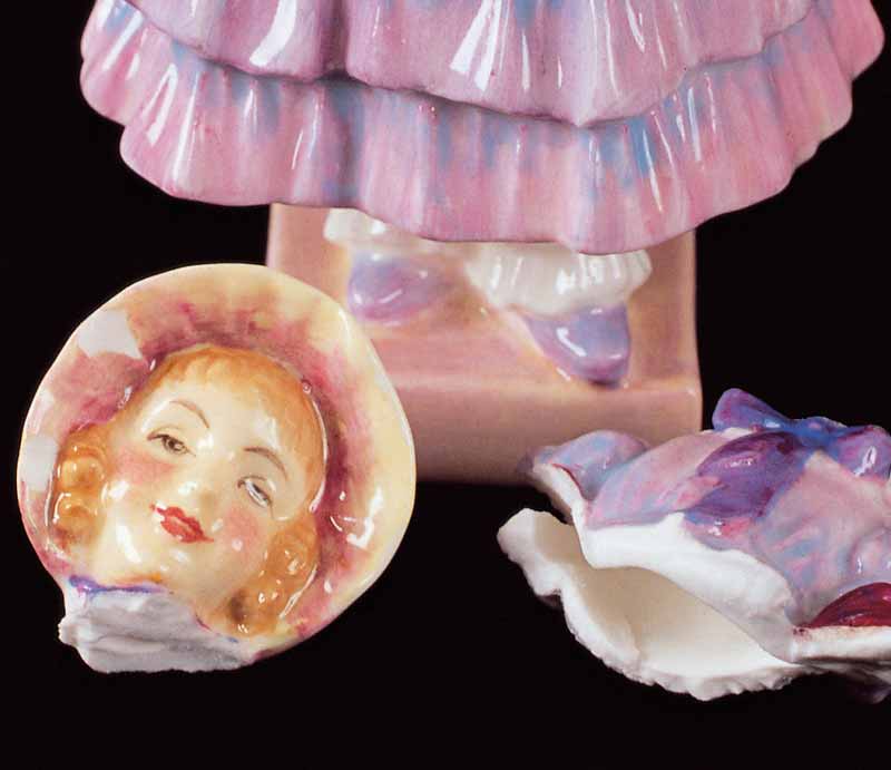 Royal Doulton Figurine Detached head and broken torso.